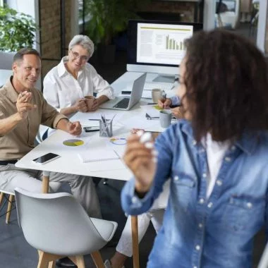 people-using-digital-device-while-meeting